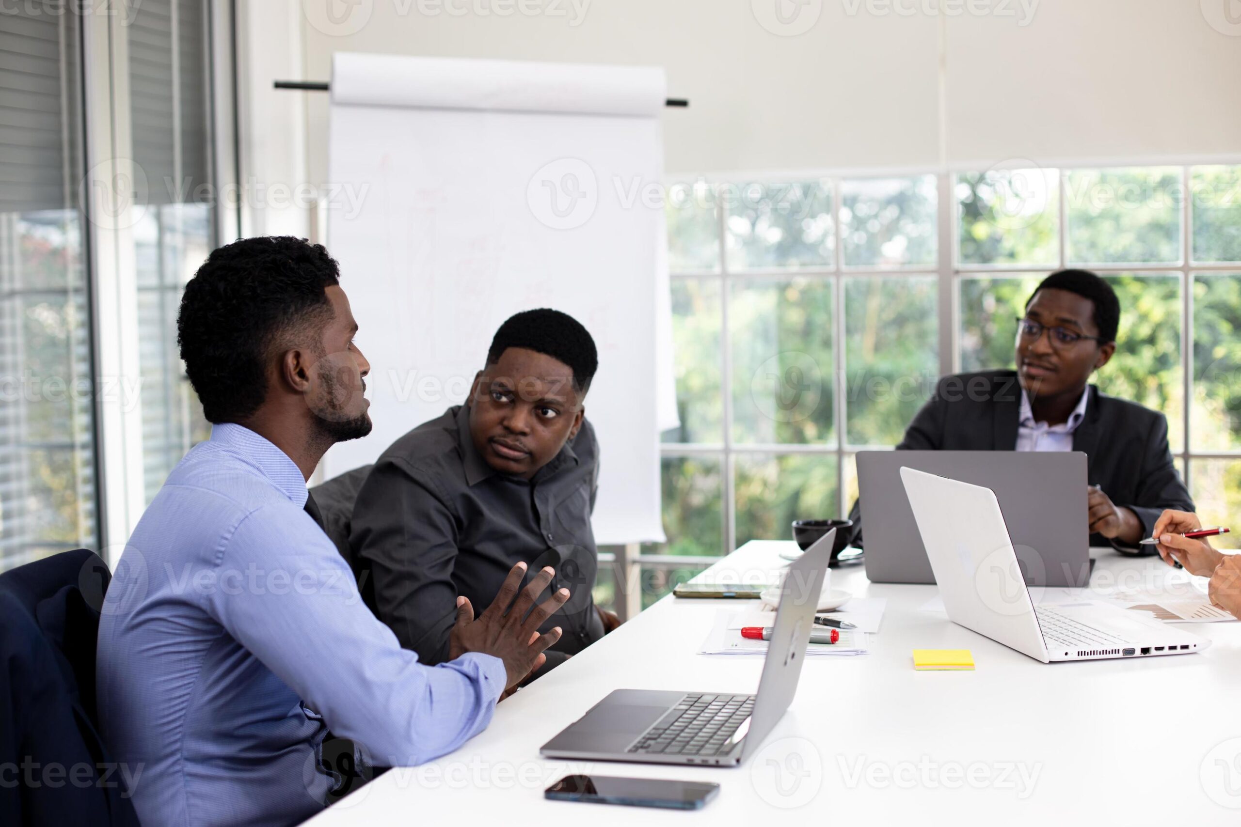 people-at-the-office-having-a-business-meeting-near-an-accountability-board-young-start-up-business-team-working-in-meeting-room-photo